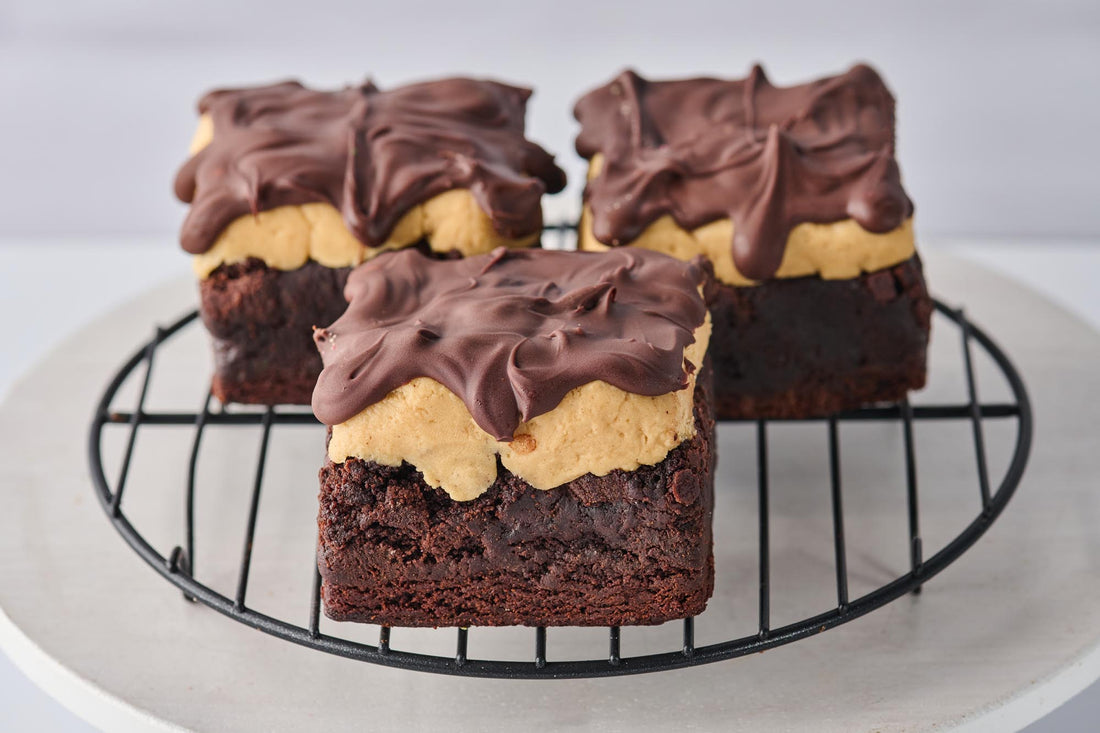 The Bucky Brownie with fudgy chocolate base, creamy peanut butter center, melted chocolate topping, and a sprinkle of sea salt