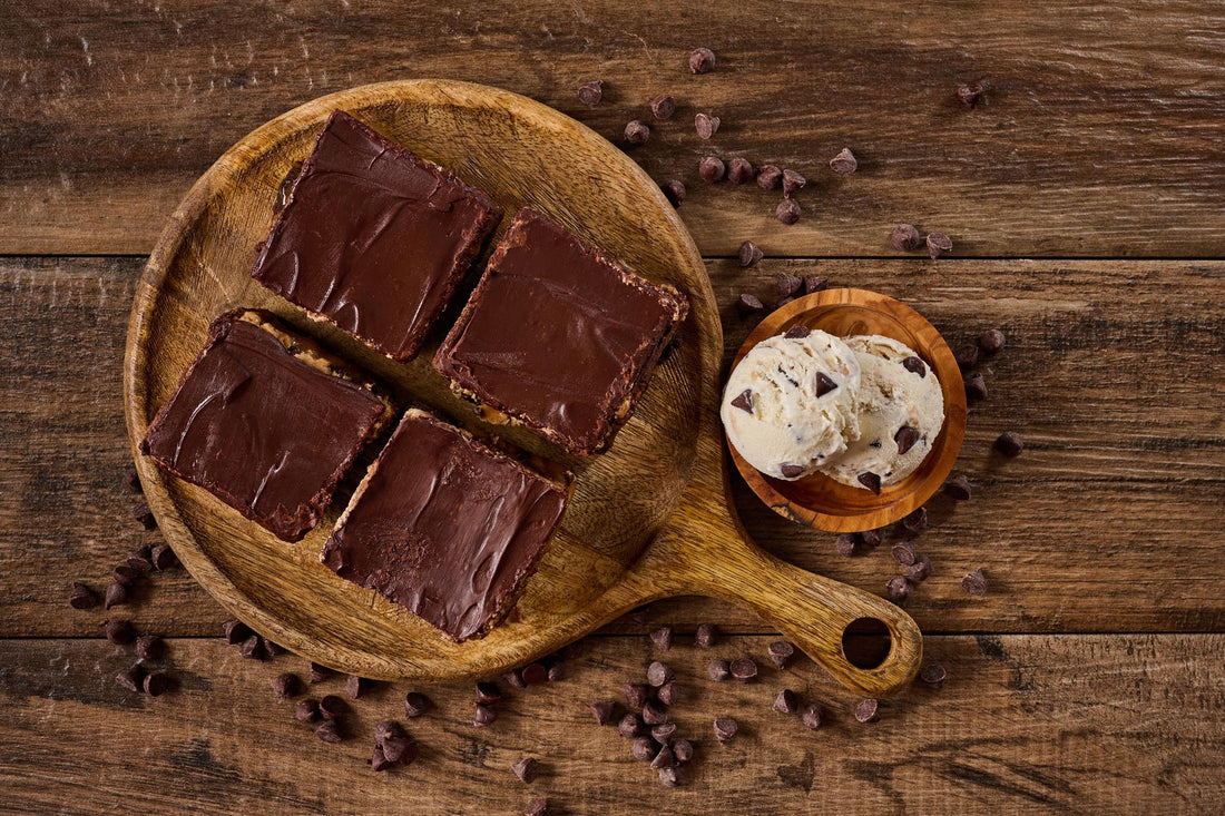 Millidough Million Dollar Cookie Dough Brownie with fudgy brownie base, caramel, homemade cookie dough, chocolate chips, and melted chocolate topping