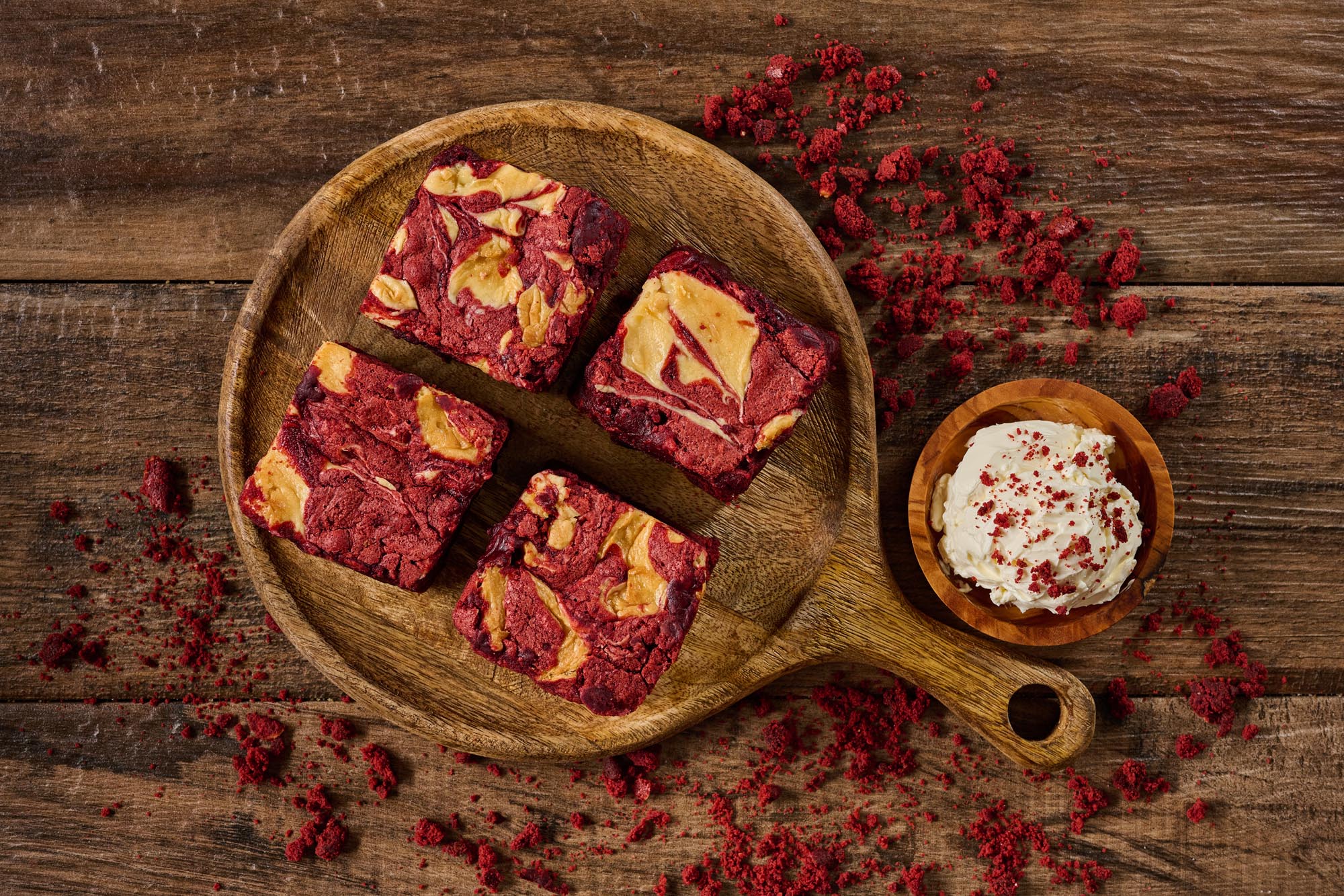 Red Velvet and Cream Cheese Brownie with a fudgy red velvet base and creamy cream cheese swirl, showcasing a rich, indulgent dessert with a vibrant color contrast and smooth texture