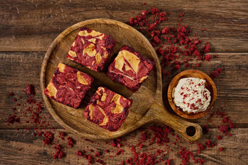 Red Velvet and Cream Cheese Brownie with a fudgy red velvet base and creamy cream cheese swirl, showcasing a rich, indulgent dessert with a vibrant color contrast and smooth texture
