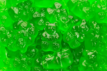 Green apple gummy bears with bright green color and chewy texture, Chewy green apple gummy bears fruit candy, Tangy green apple gummy bears candy close-up, Green apple flavored gummy bears snack, Gourmet green apple gummy bears with soft chewy bite, Green apple gummy bears perfect for parties and candy buffets, Fruit flavored green apple gummy bears candy, Green apple gummy bears displayed for candy jars, Sweet green apple gummy bears in bulk, Classic green apple gummy bear candy