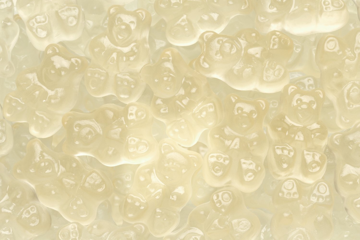 Pineapple gummy bears with bright yellow color and chewy texture, Tropical pineapple gummy bears candy close-up, Chewy pineapple gummy bears fruit candy, Yellow pineapple gummy bears in bulk, Pineapple flavored gummy bears for candy lovers, Gourmet pineapple gummy bears with soft chewy bite, Pineapple gummy bears perfect for parties and candy buffets, Fruit flavored pineapple gummy bears snack, Pineapple gummy bears displayed for candy jars, Tropical gummy bears with bold pineapple flavor