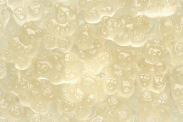 Pineapple gummy bears with bright yellow color and chewy texture, Tropical pineapple gummy bears candy close-up, Chewy pineapple gummy bears fruit candy, Yellow pineapple gummy bears in bulk, Pineapple flavored gummy bears for candy lovers, Gourmet pineapple gummy bears with soft chewy bite, Pineapple gummy bears perfect for parties and candy buffets, Fruit flavored pineapple gummy bears snack, Pineapple gummy bears displayed for candy jars, Tropical gummy bears with bold pineapple flavor